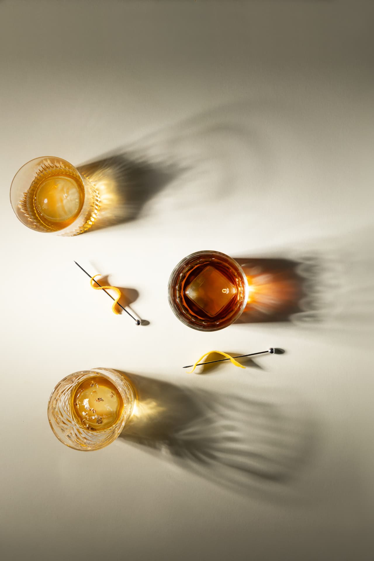 Three tasting glasses in warm grazing light